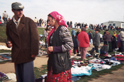 reading-an-sms-in-the-flea-market-of-targu-mures-2010